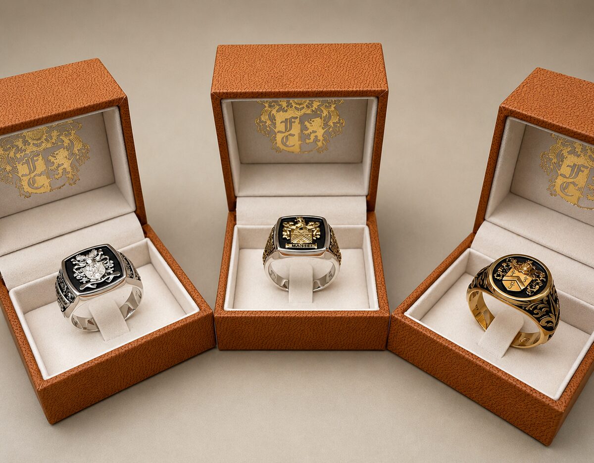 A trio of crest rings in silver & gold