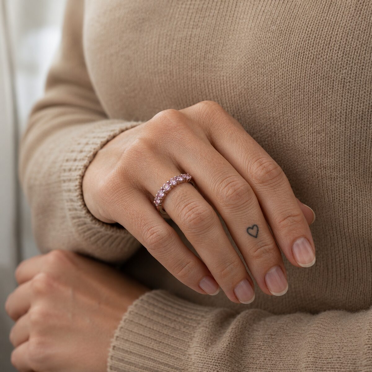 Pink sapphire band, worn