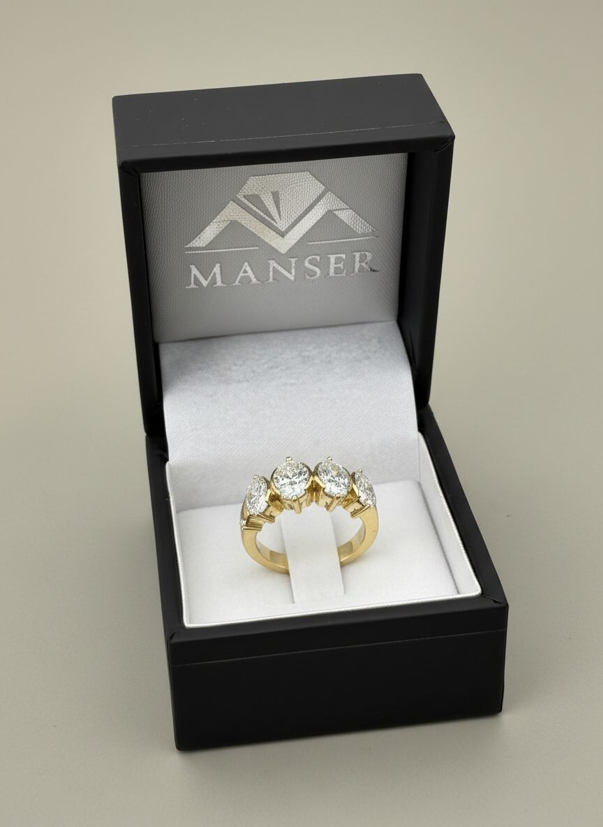 Four-stone oval diamond band, 18ct gold