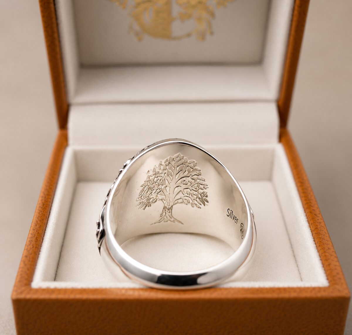 Tree-of-life engraving inside the band