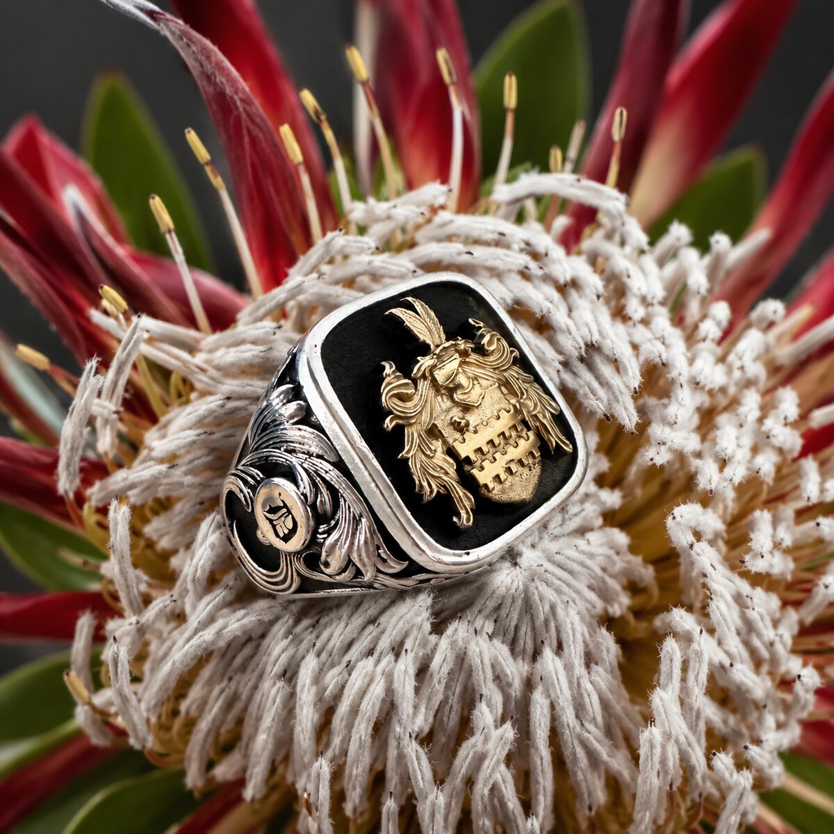 Crest ring with hand-engraved shoulders