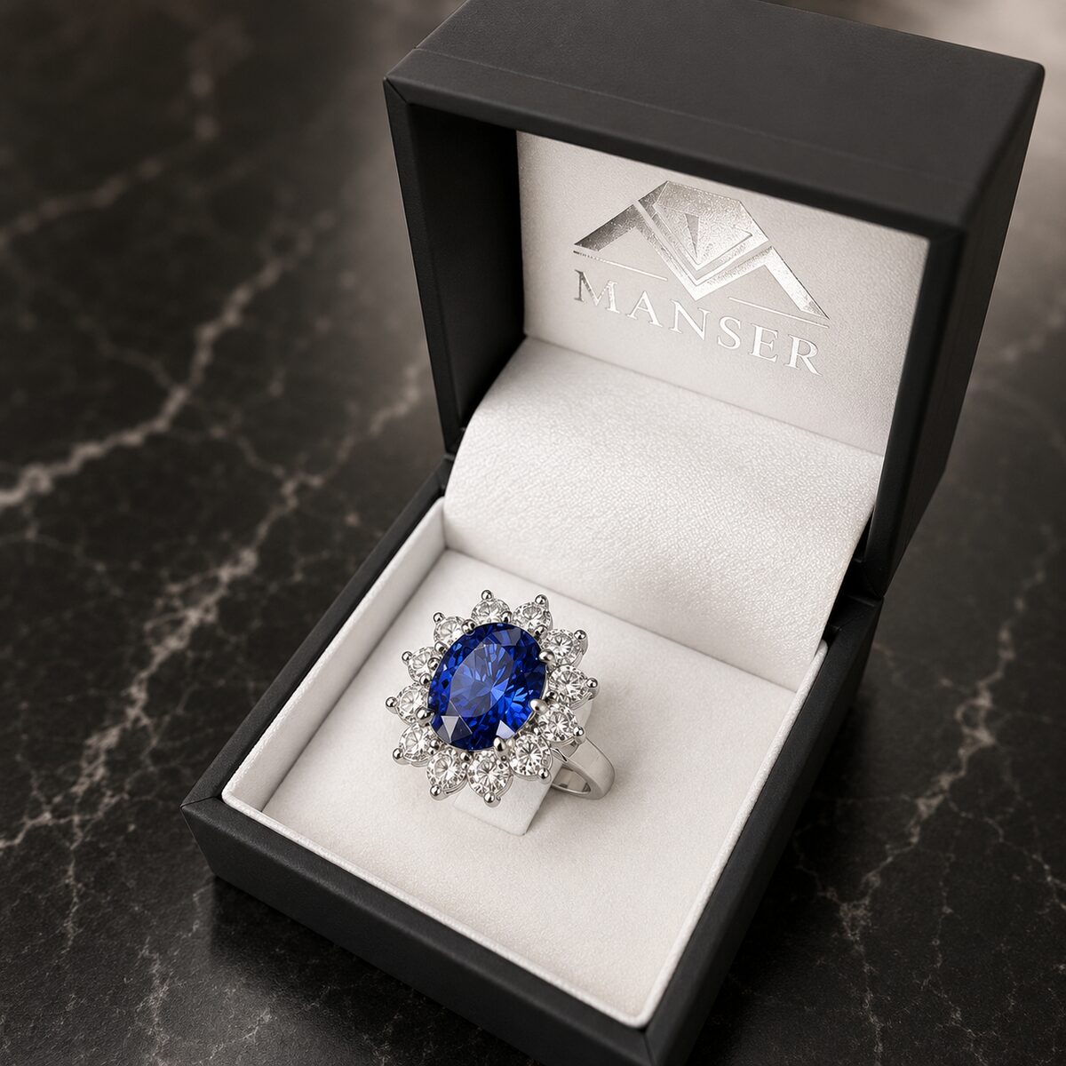 Blue sapphire oval halo ring, white gold